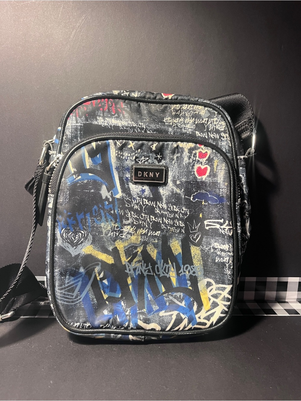 DKNY Black Graffiti Print Messenger Crossbody with Blue, Yellow & Red Accents